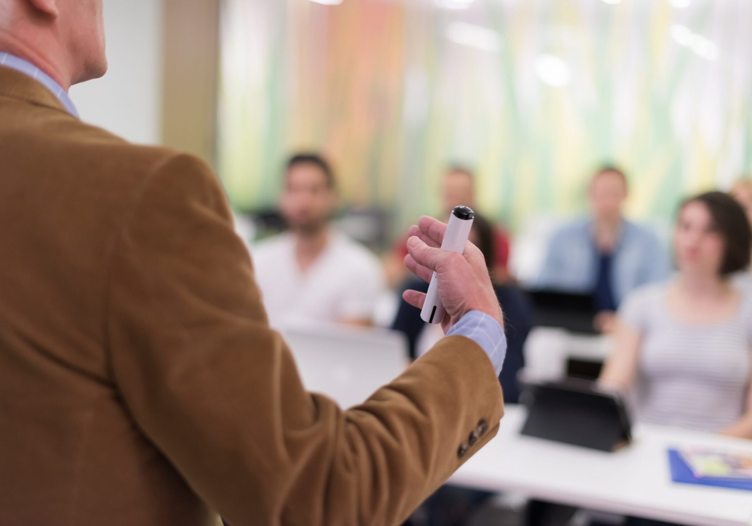 vecteezy_teacher-with-a-group-of-students-in-classroom_12440713_937 (1)